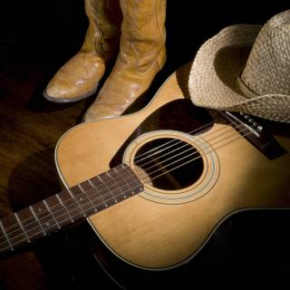 my guitar , my cowboy hat , my cowboy boots