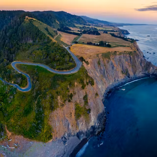 Aerial View Of Winding Coastal Road