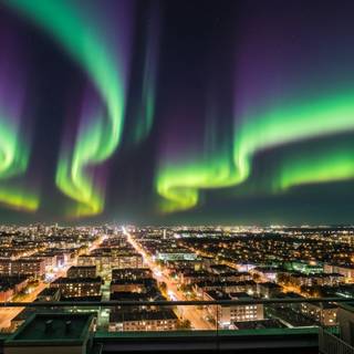 beautiful city with northern lights