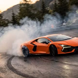 Lamborghini Revuelto 2024 orange drifting