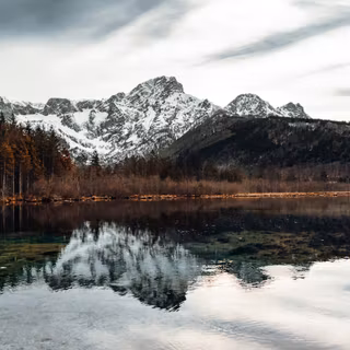 Snowy Alpine Lake Autumn Forest View