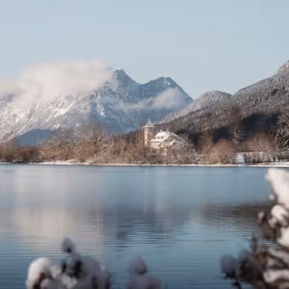Sunlit Snowy Shoreline On Lake Bad Aussee