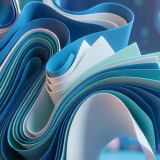 Ocean Blue & Mint Paper Swirls - A cool-toned 3D abstract artwork featuring dynamic, layered ribbons of matte royal blue, turquoise, mint green, and crisp white, set against a softly blurred background filled with playful geometric shapes.