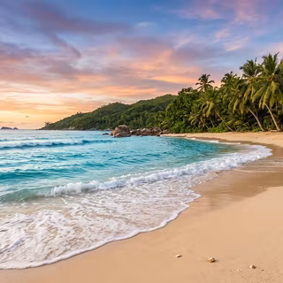Tropical Paradise Sunset Beach - A breathtaking high-resolution landscape photograph showcasing a pristine sandy beach lined with lush green palm trees and granite boulders, gently washed by turquoise ocean waves under a vibrant sunset sky filled with soft pink, golden, and purple clouds.