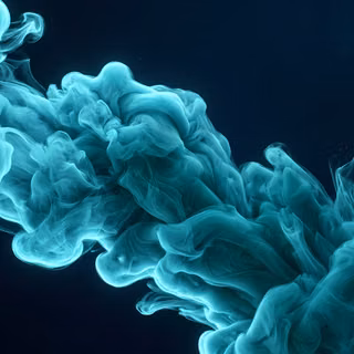 Cyan Ink in Water Fluid Abstraction - A high-resolution 3D digital render featuring billowing plumes of luminous teal and cyan acrylic ink expanding underwater, creating complex fluid dynamics and fine particle textures against a deep navy-black background.
