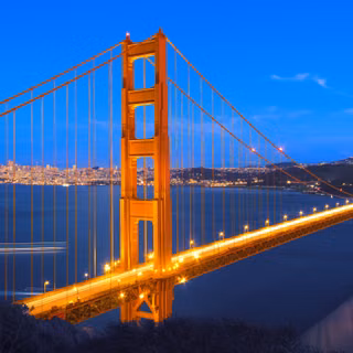 Illuminated Golden Gate Bridge At Night In San Francisco