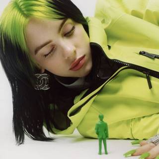 Billie Eilish w/ Green Toy Man