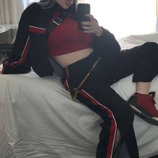 Younger Billie Eilish w/ a Black & Red Outfit
