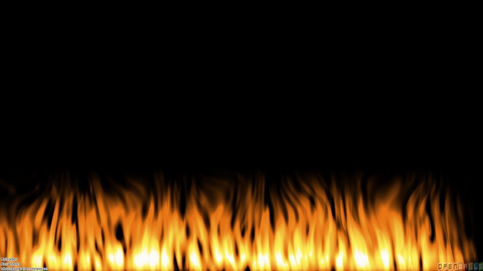 Flames on the black background wallpaper