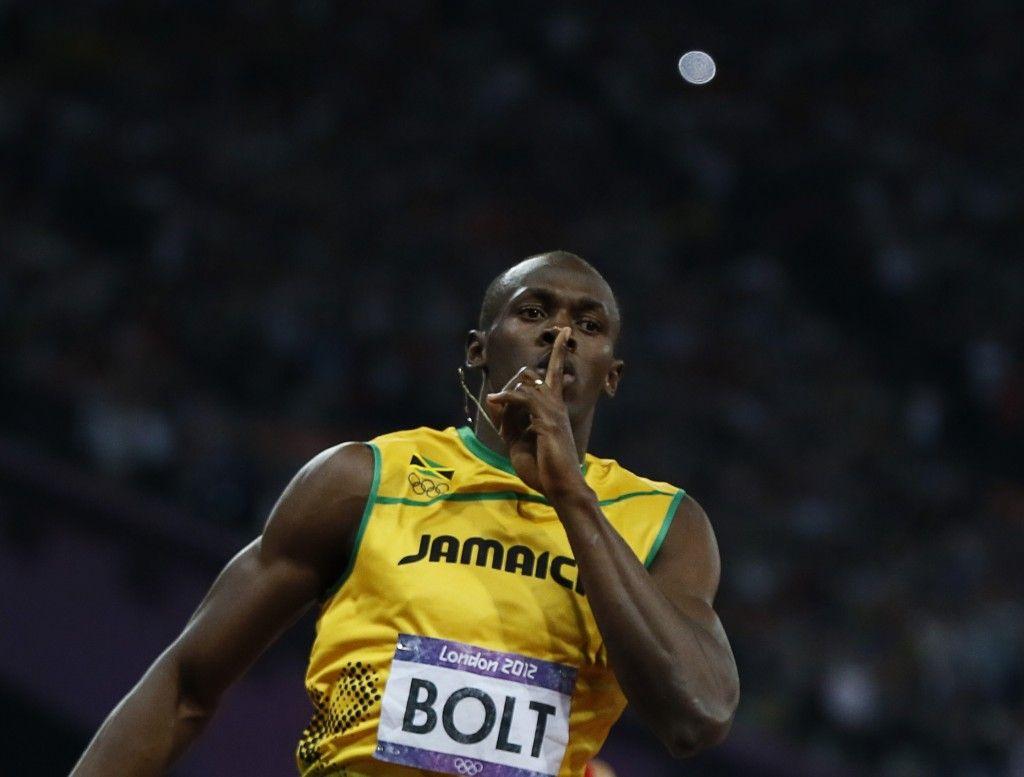 Jamaica&;s Usain Bolt celebrates winning the men&;s 200m final
