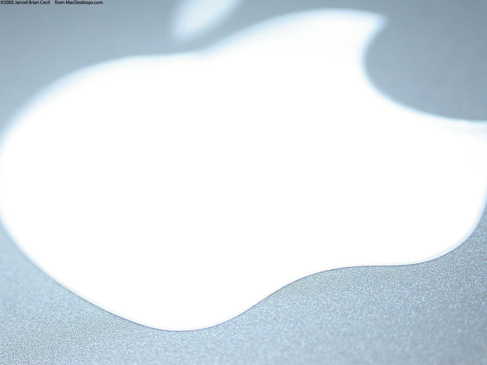 Glowing white Apple free desktop background wallpaper image