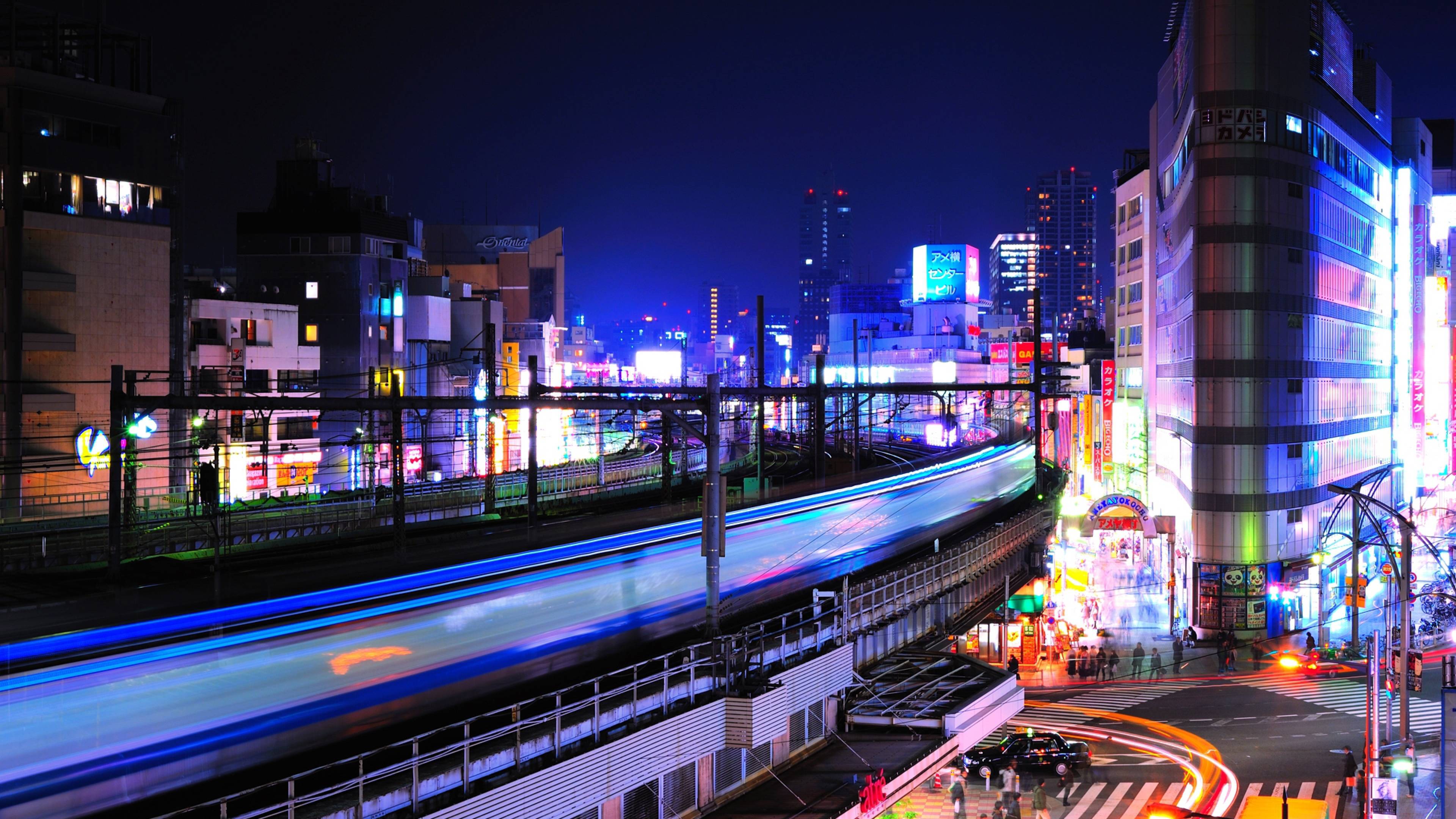 Download Wallpaper 3840x2160 night, lights, buildings, railway