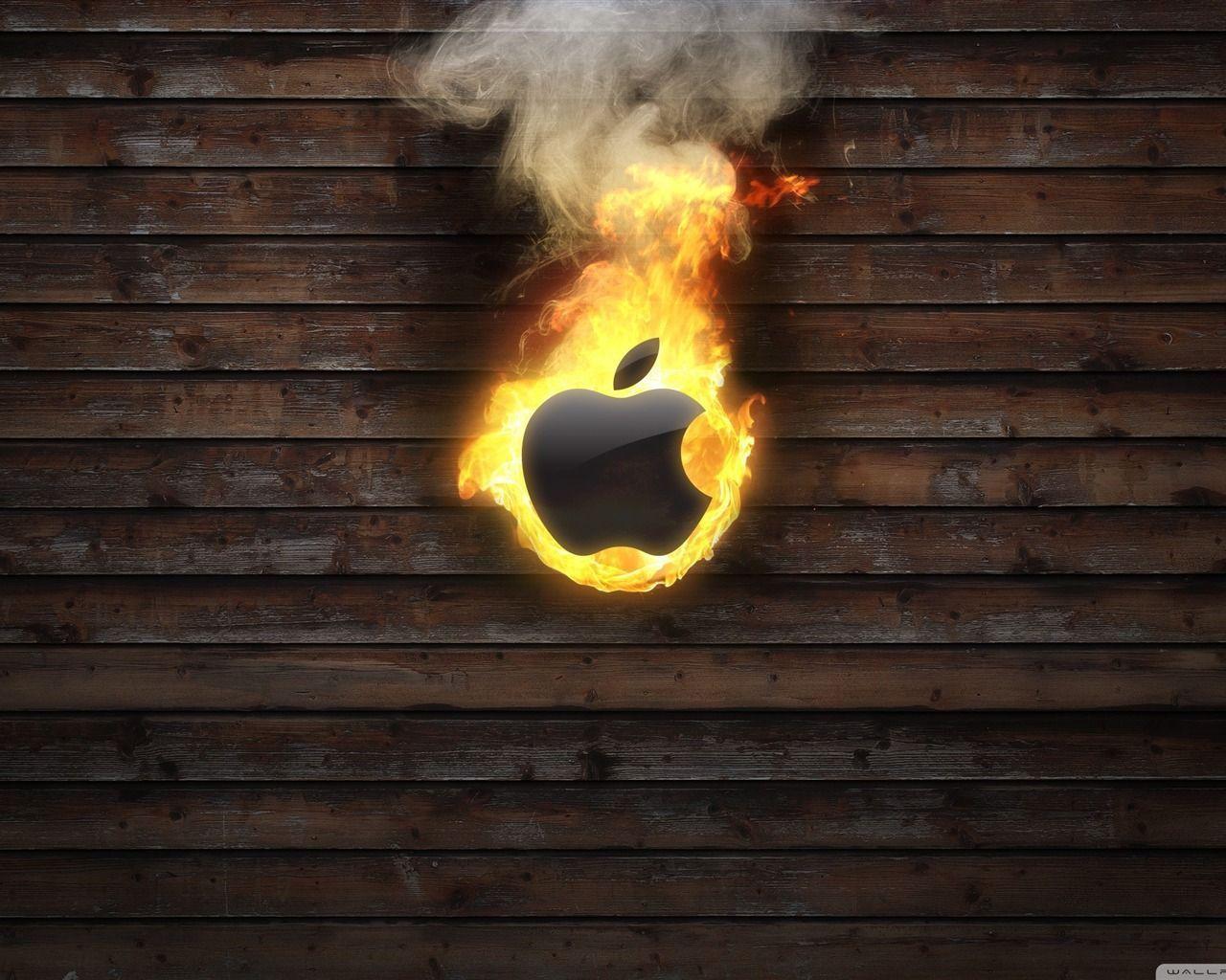 apple logo on fire