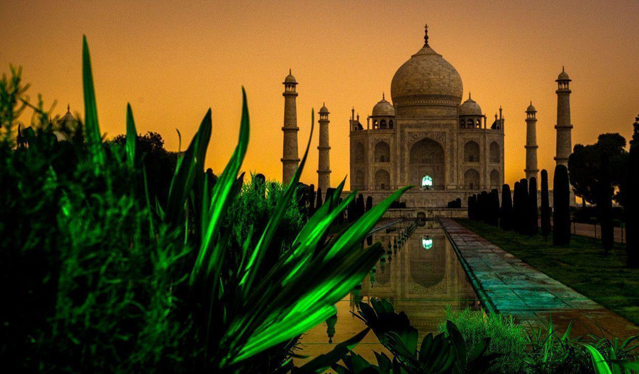 Taj Mahal in Midnight with City Lights illuminating