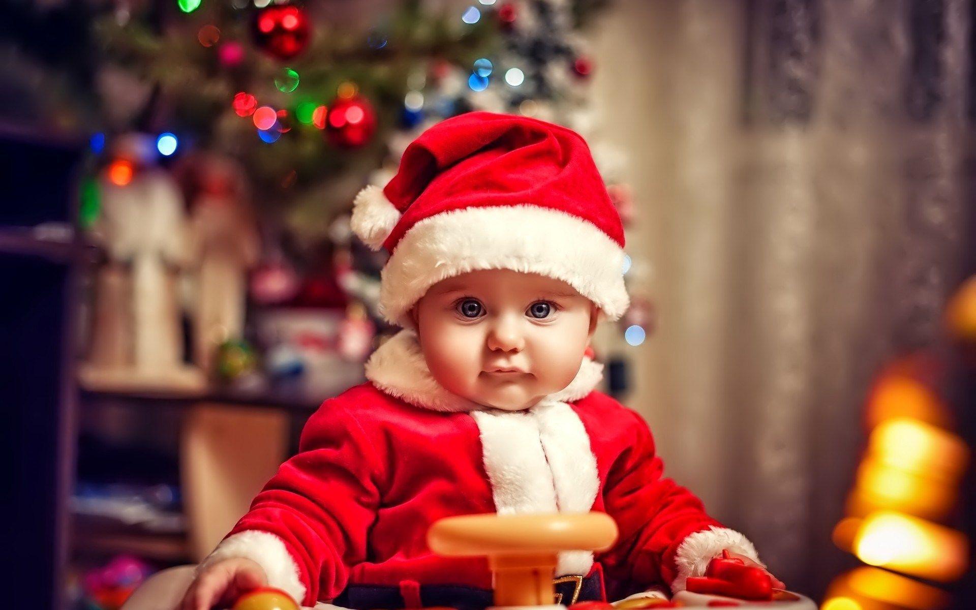 child dressed as santa claus wide HD wallpaper