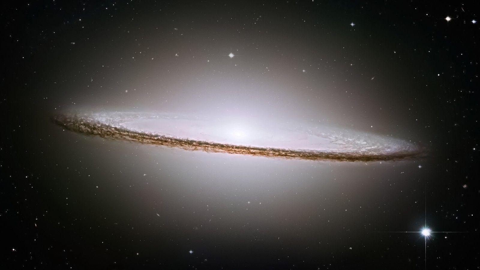 Sombrero galaxy (M) is a bright spiral galaxy 31727