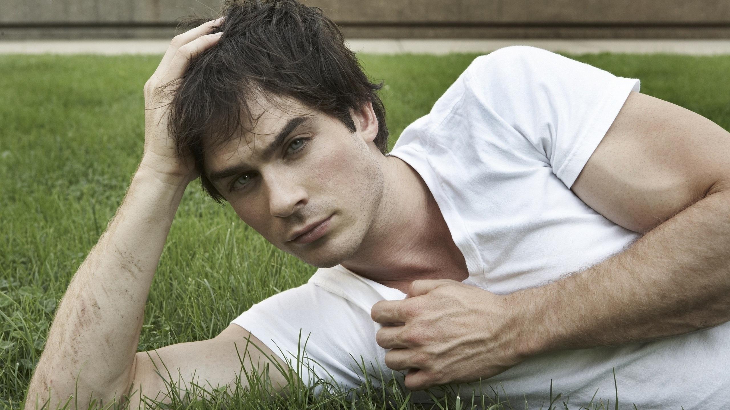 Download Free 2560x1440 Ian Somerhalder laying grass Desktop