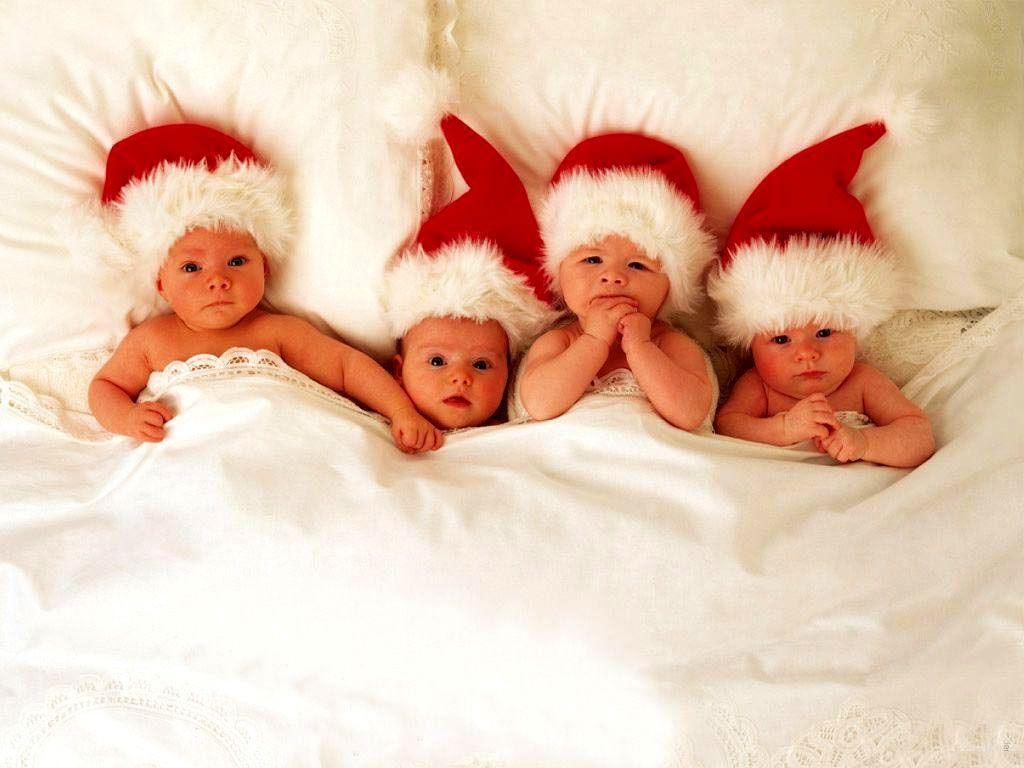 Free Four Cute Christmas Babies wallpapers Wallpapers