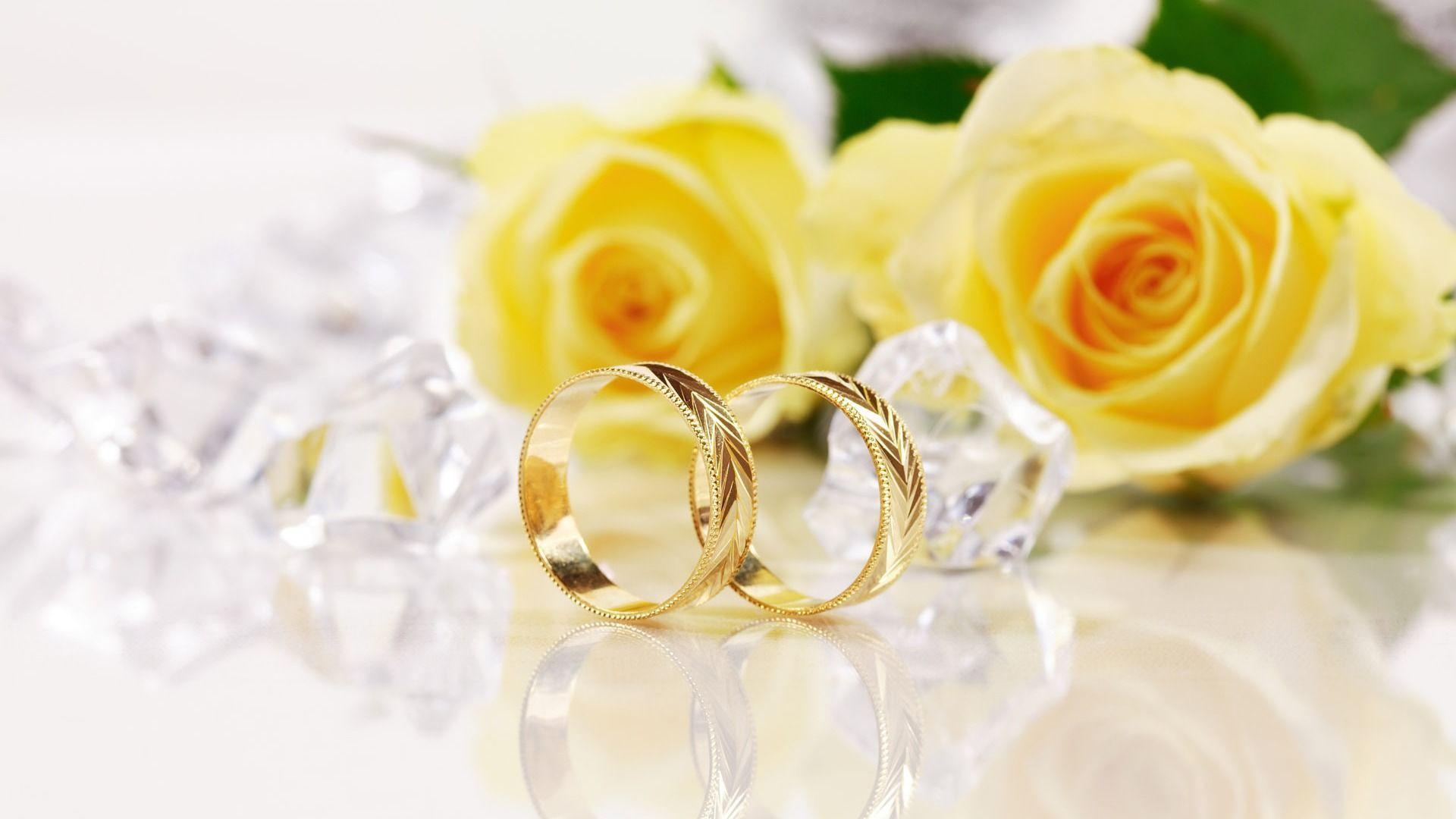 Wedding Rings And Flowers Background