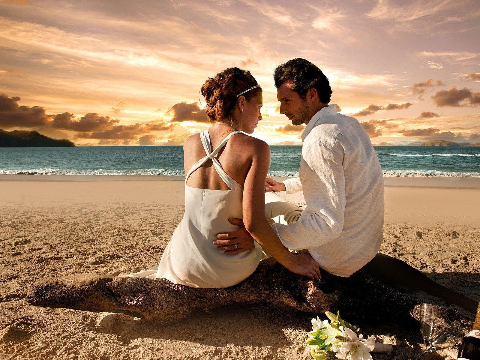 Romantic Couple At Sunset Wallpaper