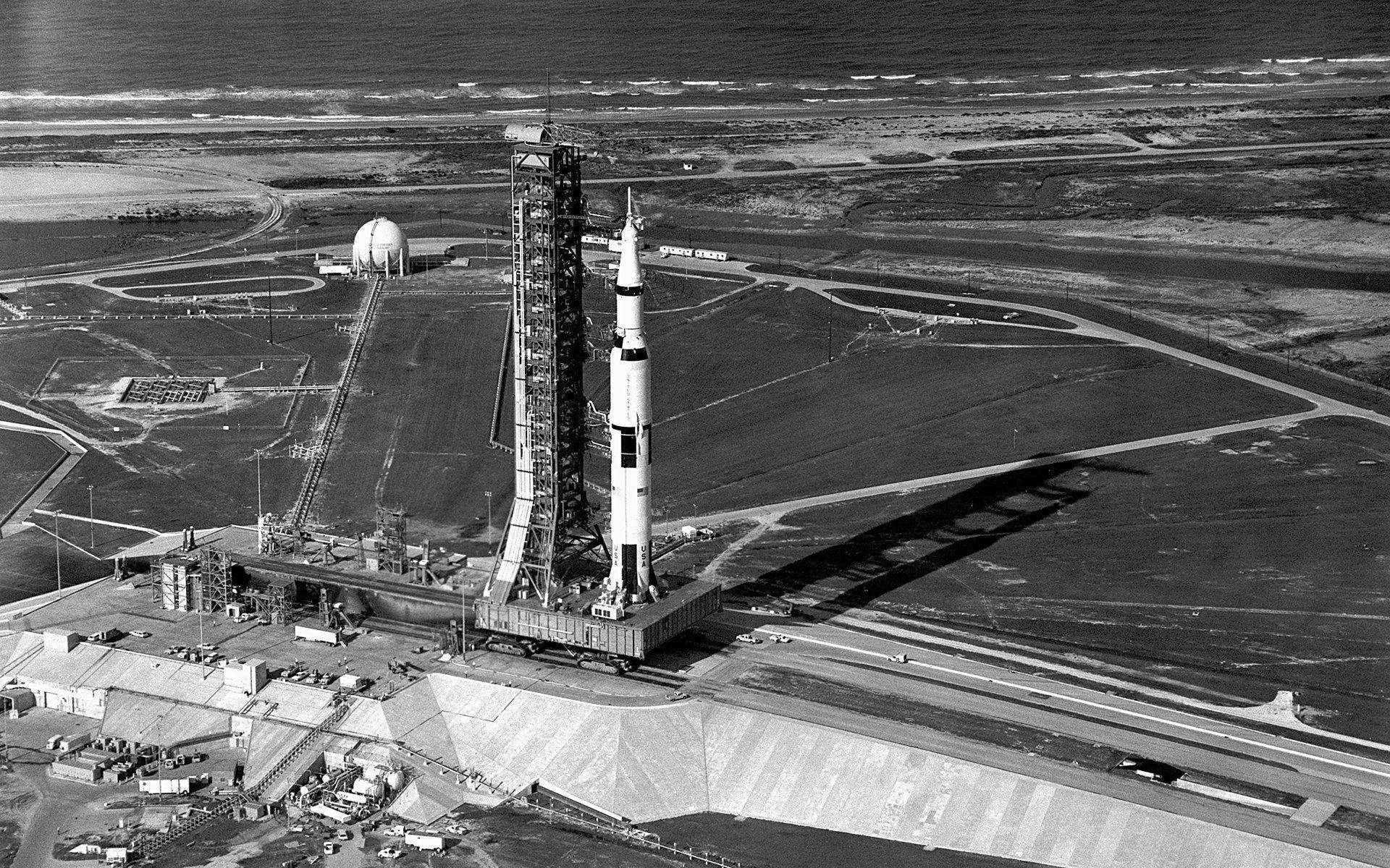 Aerial View of Apollo 11 Saturn V on Transporter Wallpaper
