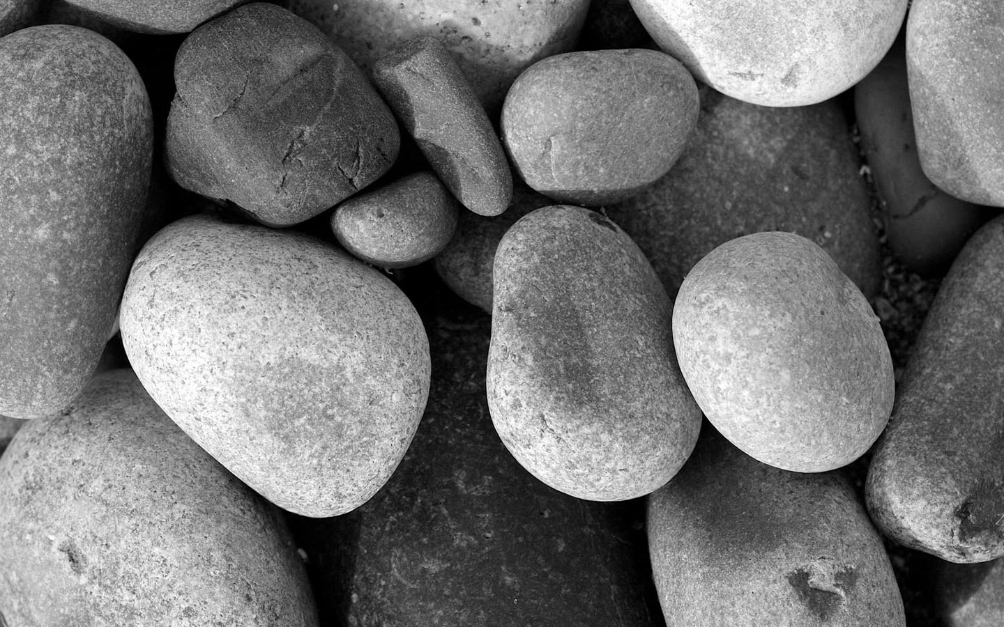 Black and White Wallpapers of Large Pebbles on a Beach.