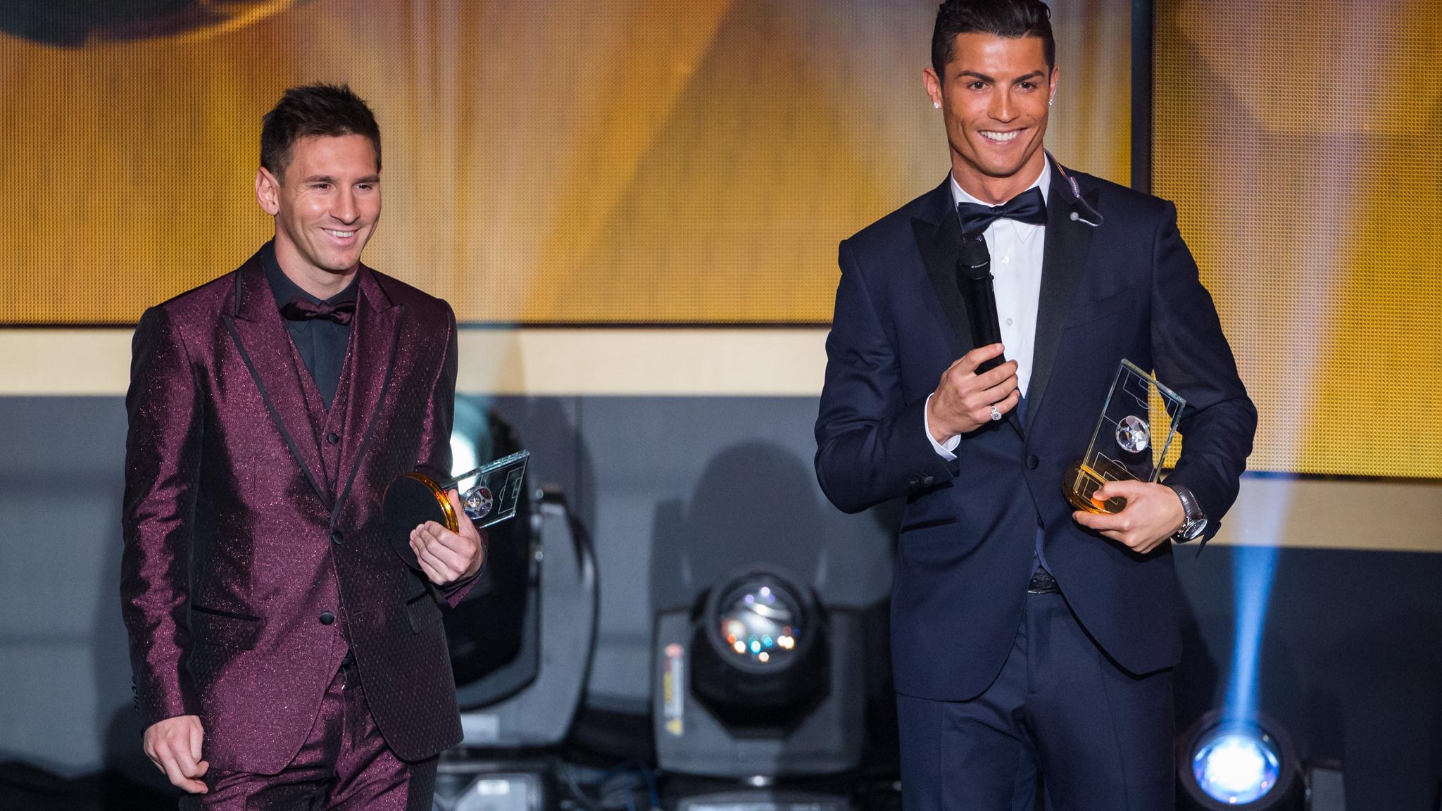 HD Lionel Messi and Cristiano Ronaldo smile during the FIFA Ballon