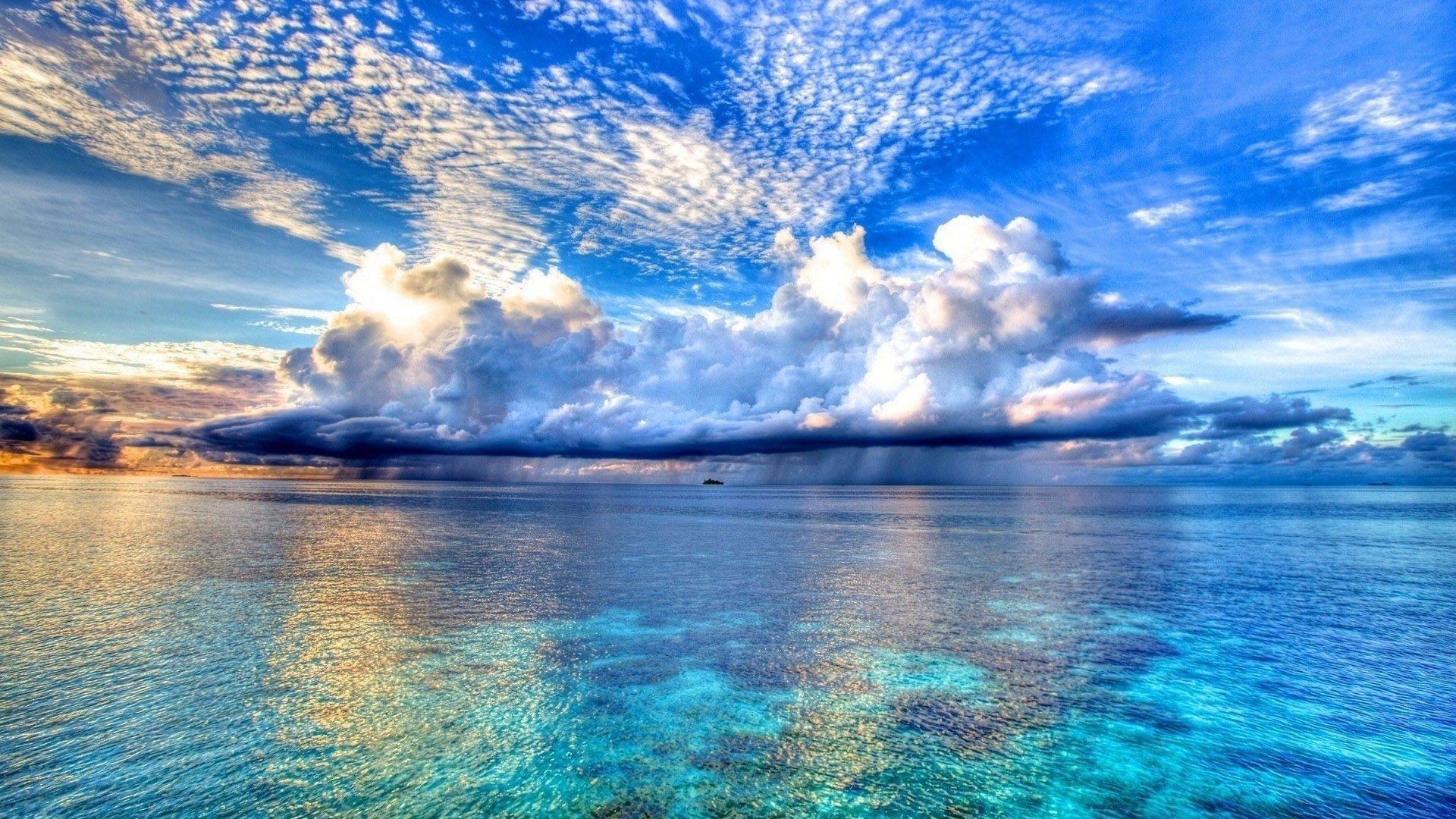 Rain Clouds Over The Sea Beach Wallpaper Wide or HD. Beaches