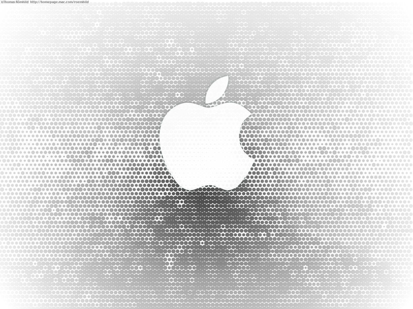 White Apple logo with dots