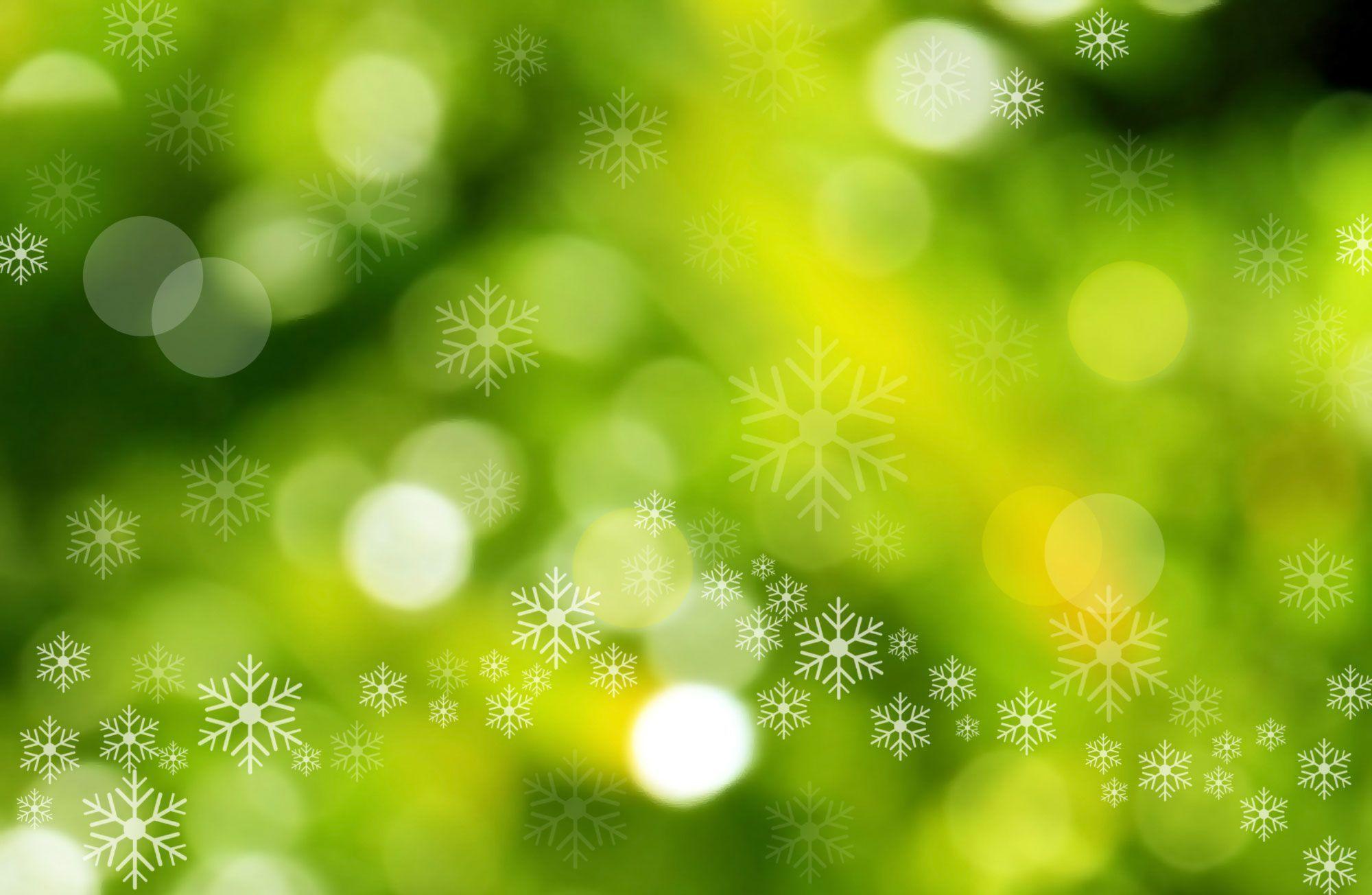 Green Christmas Background with Bokeh and Snowflakes Scatters