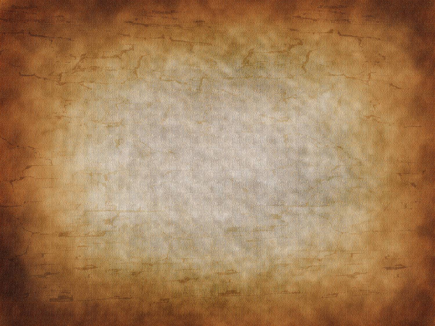 An old and worn out parchment paper background texture