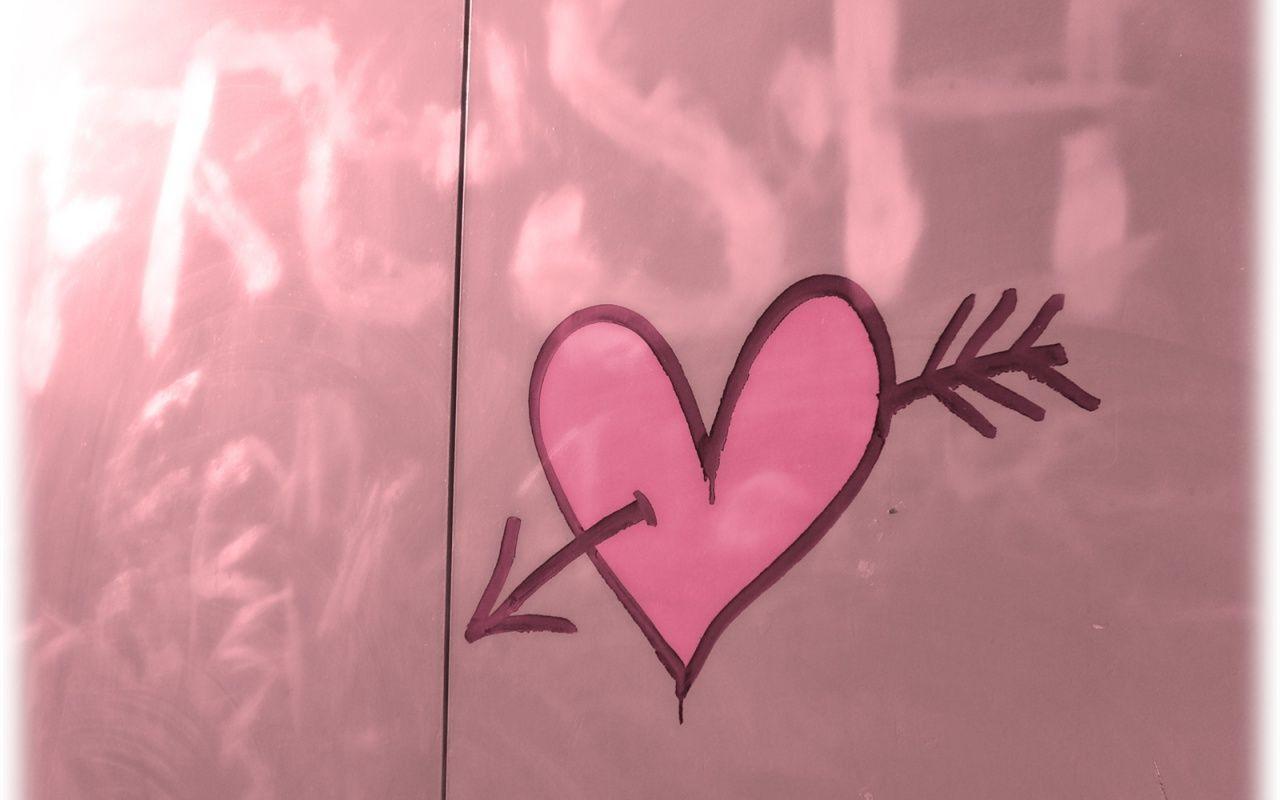 Pink heart and arrow desktop PC and Mac wallpaper