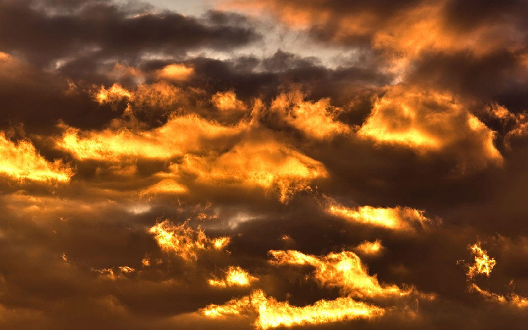 Fiery Golden Clouds Wallpaper