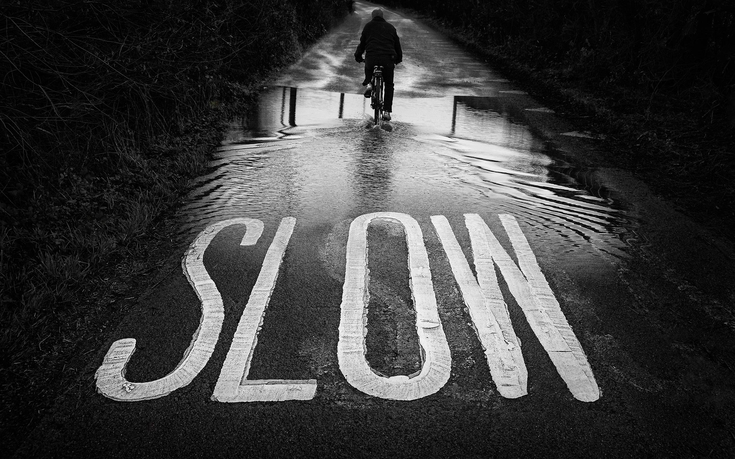 Slow BW Road Bicycle Person Puddle wallpaperx1600