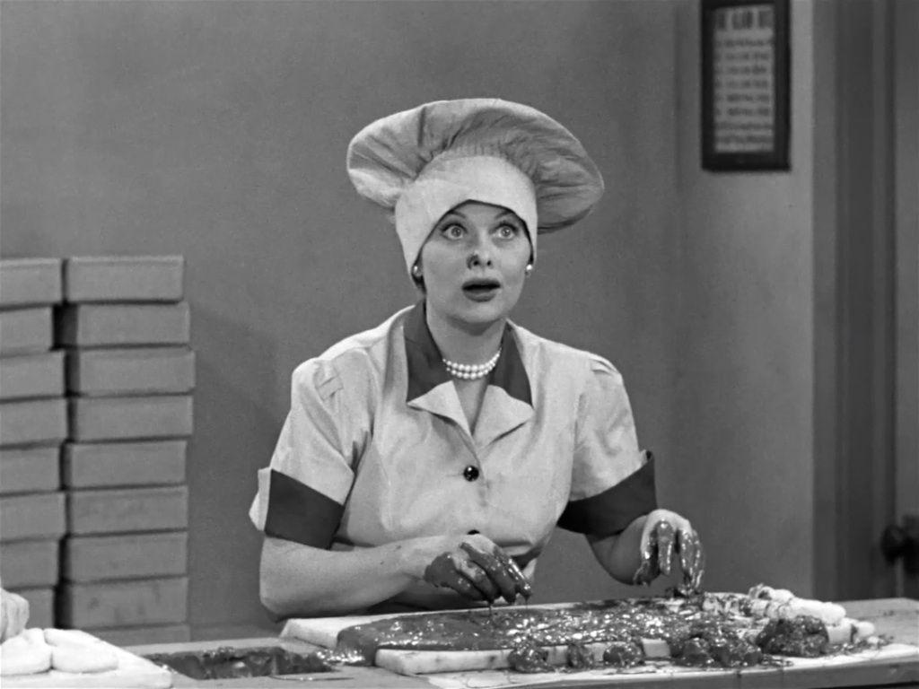 Lucy looking at fly at candy factory Love Lucy Photo 35132241
