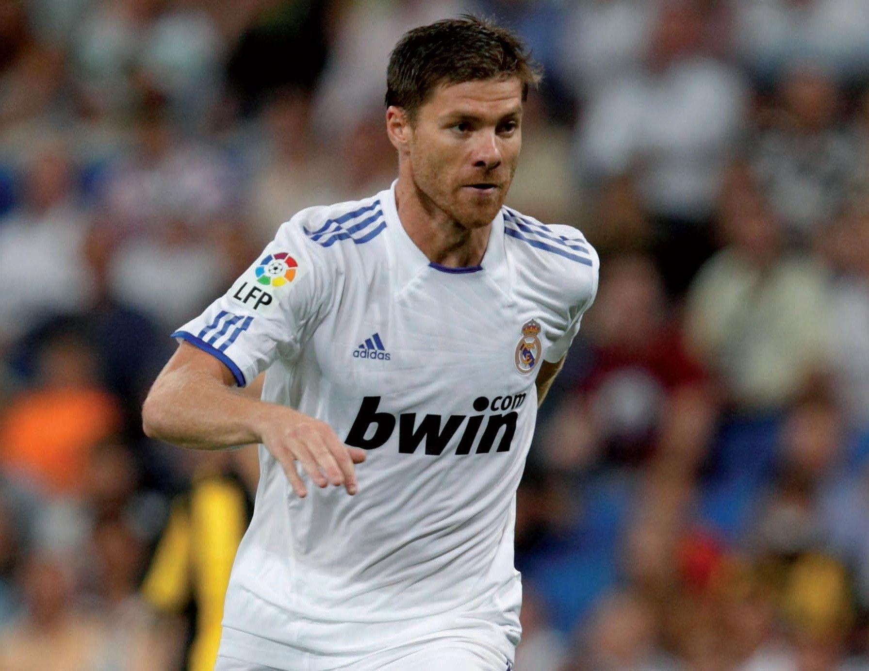  Xabi Alonso in action during his time playing for Real Madrid.