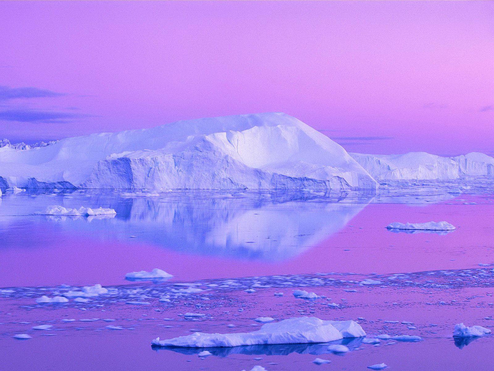 Icebergs and snow in jakobshavn disko bay Greenland free desktop