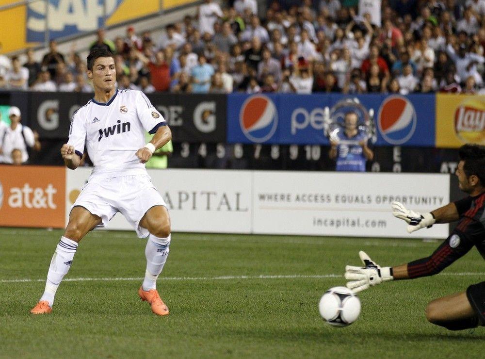 Real Madrid&;s Cristiano Ronaldo Scores Past A.C. Milan&;s