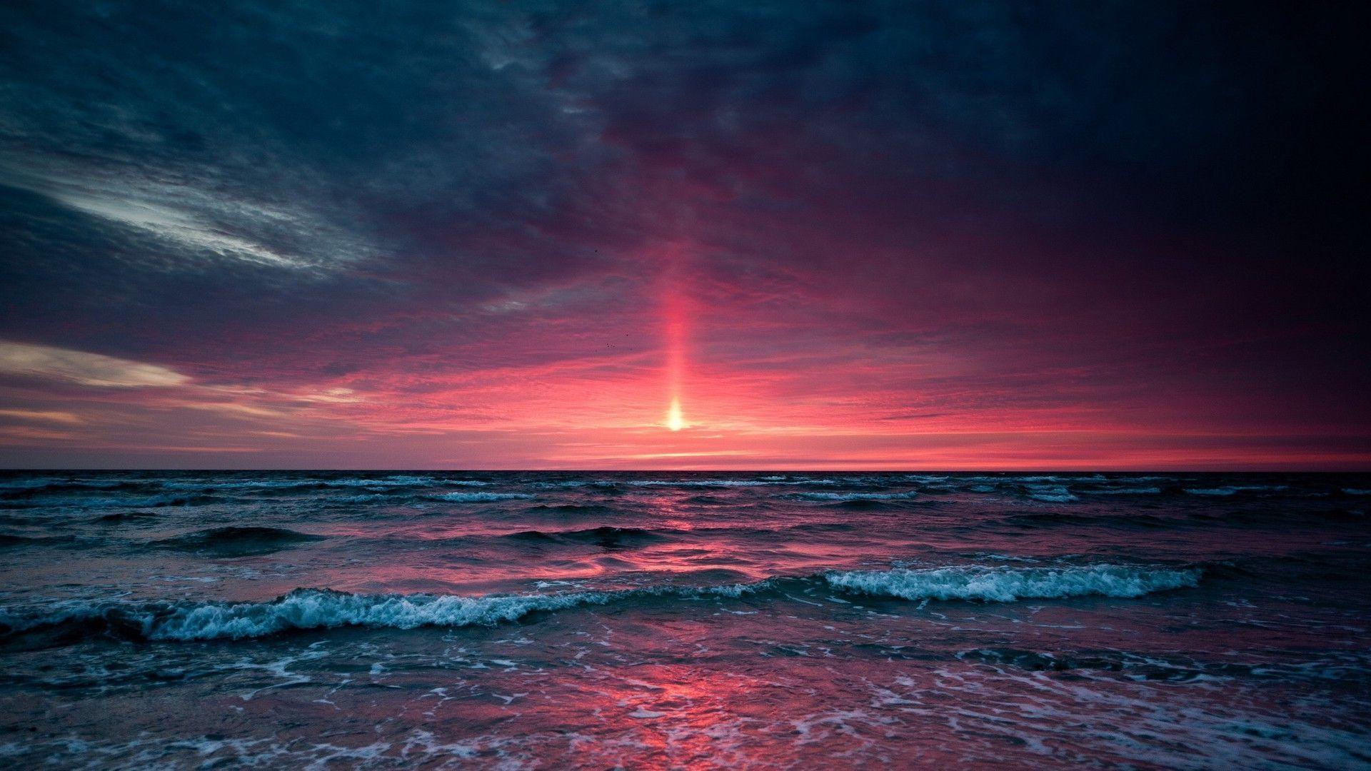 Pink sunset over the ocean Wallpaper #