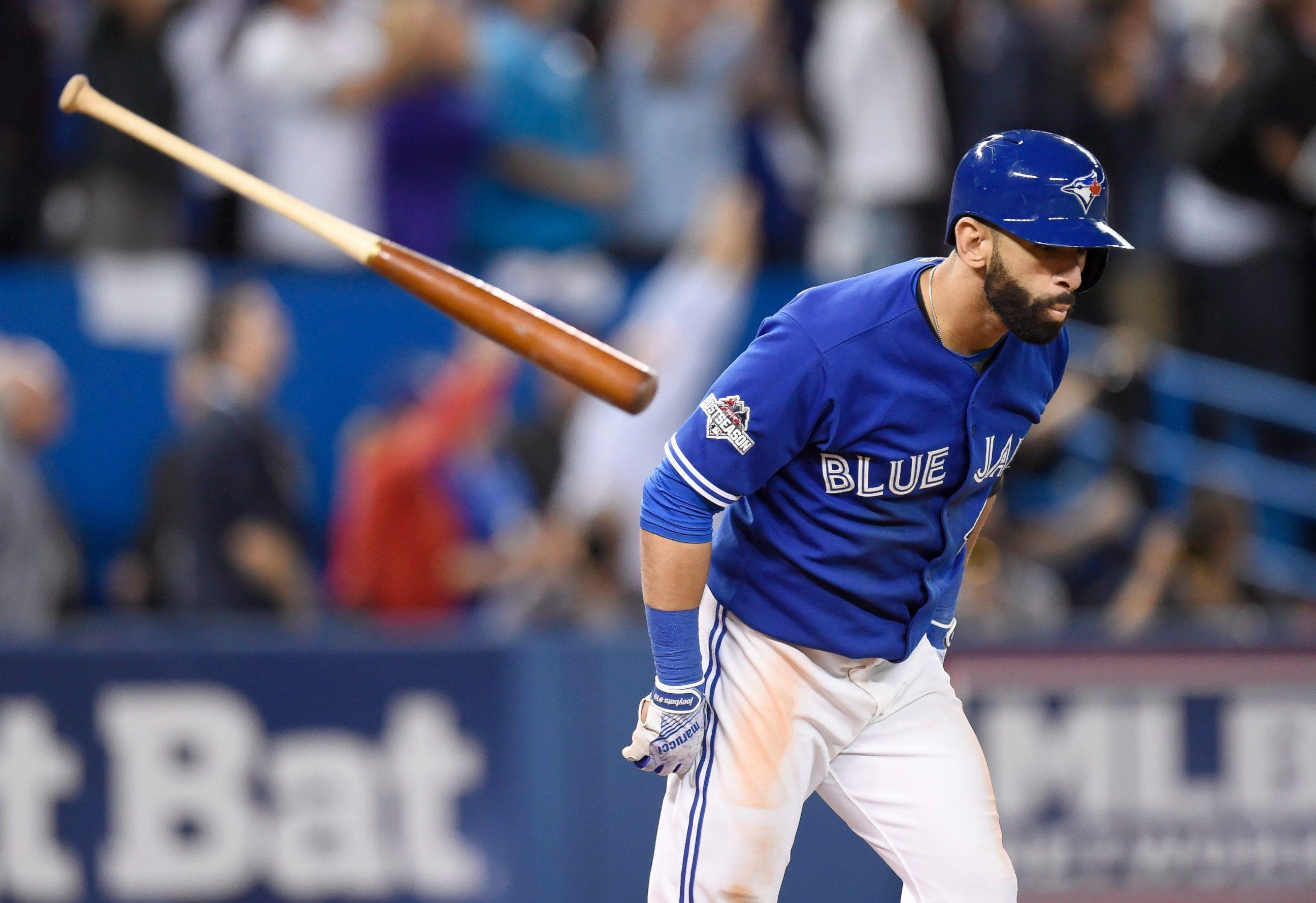 PHOTO: Toronto Blue Jays' Jose Bautista flips his bat after