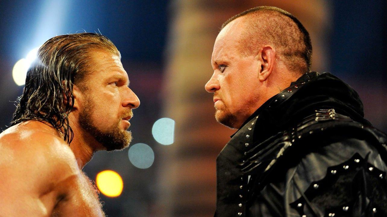 Triple H vs Undertaker HD wallpaper