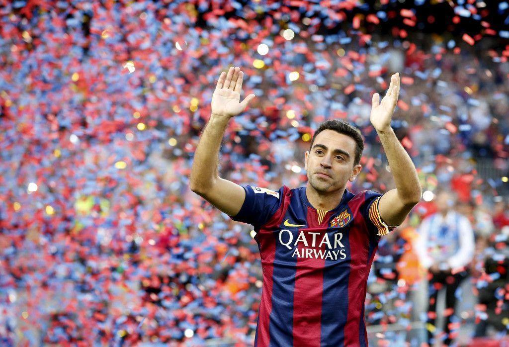 Barcelona&;s Xavi Hernandez waves to supporters after their Spanish