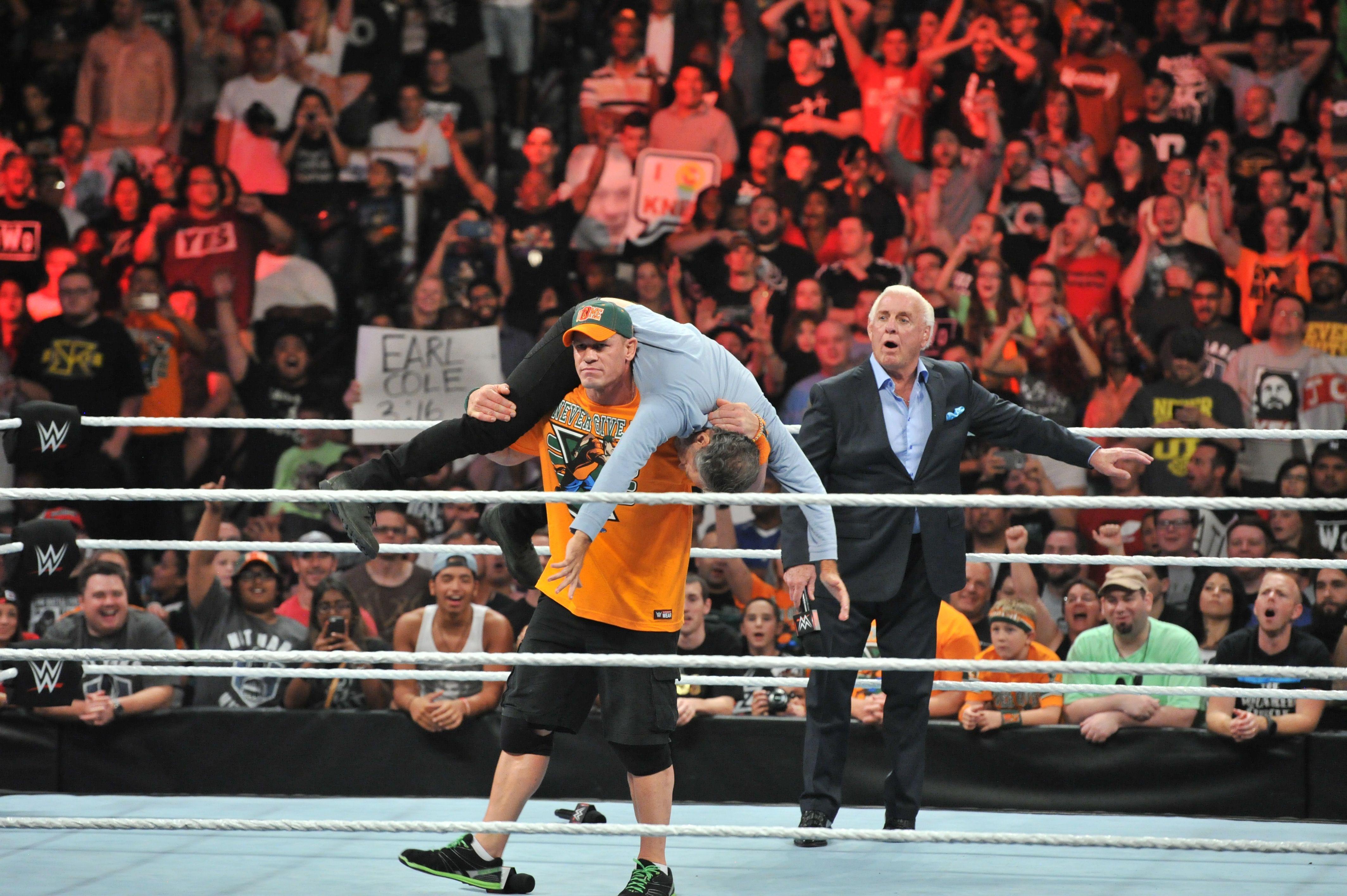 PHOTOS: John Cena Delivers an AA to Jon Stewart on WWE Raw Tonight