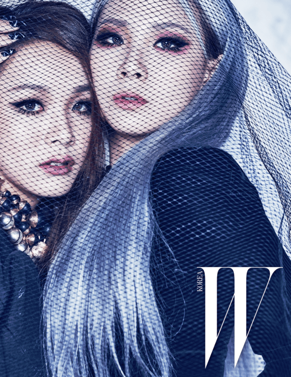 2NE1&;s CL Poses With Sister Harin In Witchy Winter Pictorial For W