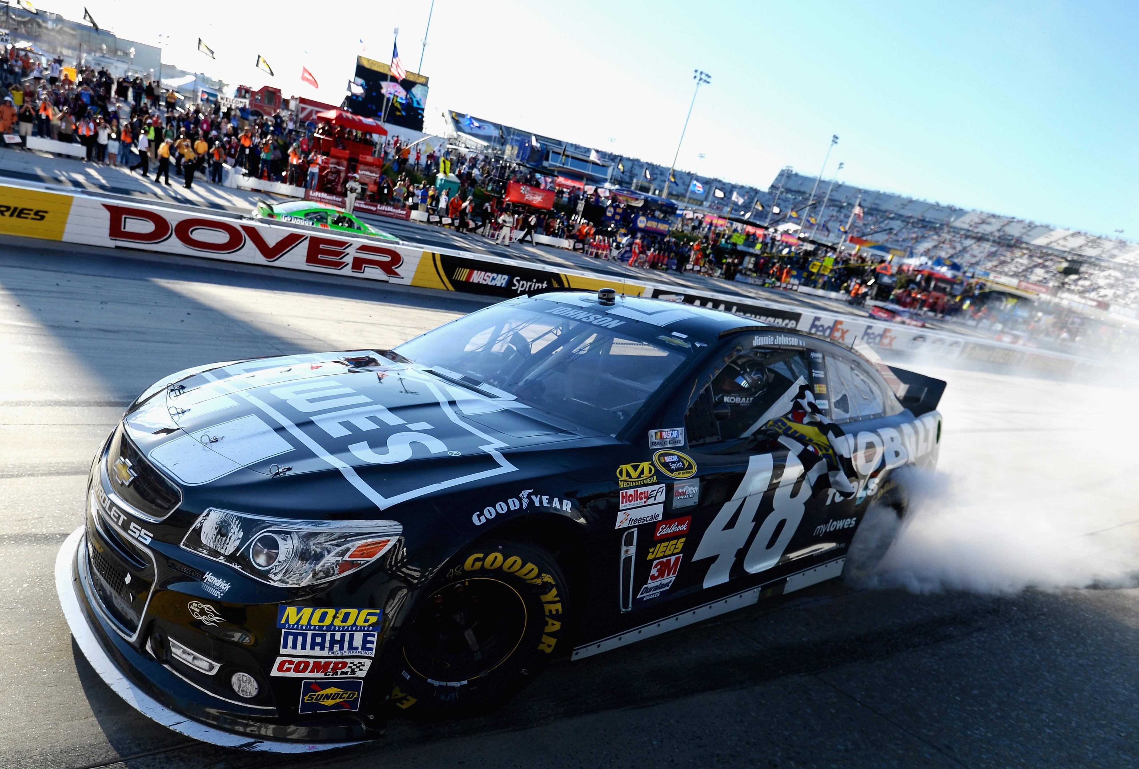 Johnson holds off Dale Jr. to win Chase race at Dover