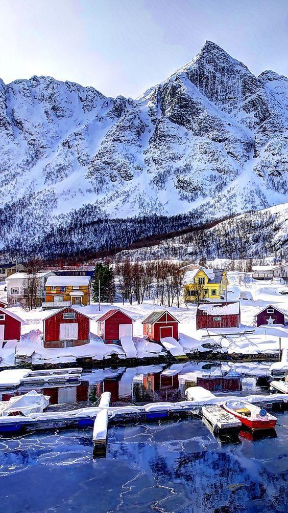 Download Wallpaper 720x1280 norway, mountains, buildings, bay