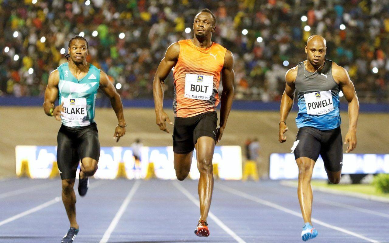 Usain Bolt coasts to victory in first 100m race in over nine