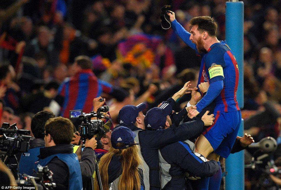 Lionel Messi celebrates with the home fans after Barca pulled off an incredible comeback against PSG