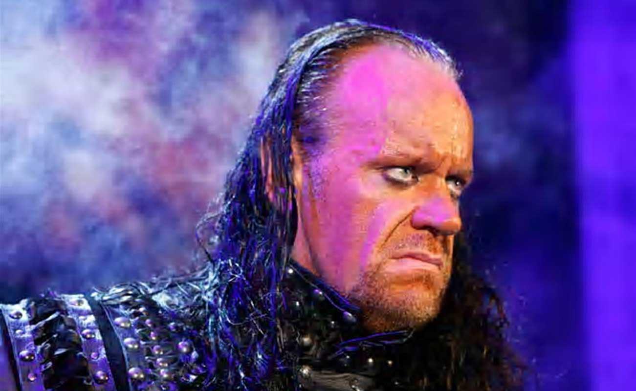 WWE Wrestlers Wallpaper Undertaker wearing black dress showing a