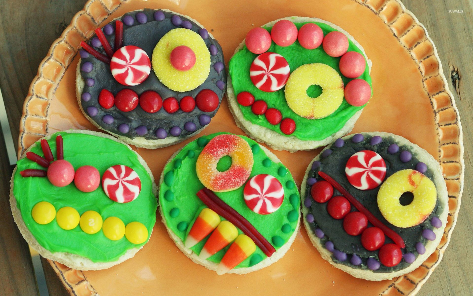 Colorful cupcakes on the pancakes wallpaper wallpaper